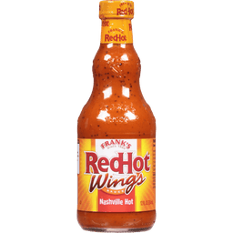["A bottle of Frank's RedHot Wings Nashville Hot Sauce."]