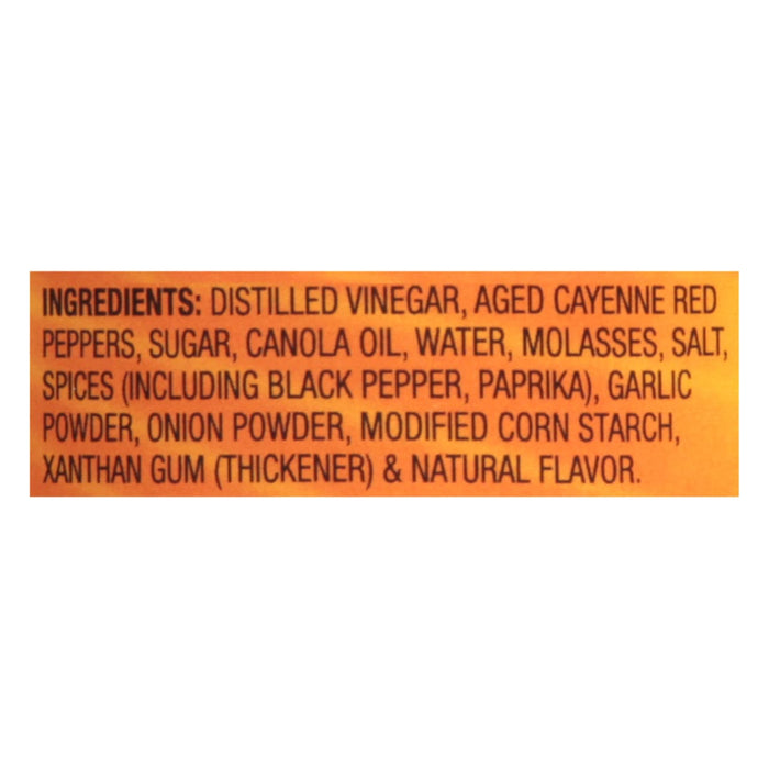 ['A list of ingredients for a product, including distilled vinegar, aged cayenne red peppers, sugar, canola oil, water, molasses, salt, spices, garlic powder, onion powder, modified corn starch, xanthan gum, and natural flavor.']
