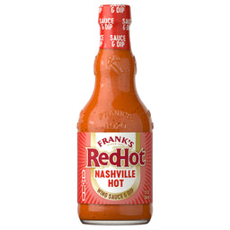 A glass bottle of Franks Red Hot Regular Wing Hot Sauce Hot 12 Oz is shown against a white background, highlighting its red label and orange-red sauce.