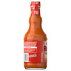 The back of a glass bottle of Franks Red Hot Regular Wing Hot Sauce Hot 12 Oz displays the product description, a recipe for Nashville Hot Wings, and the brand's slogan, I put that on everything.