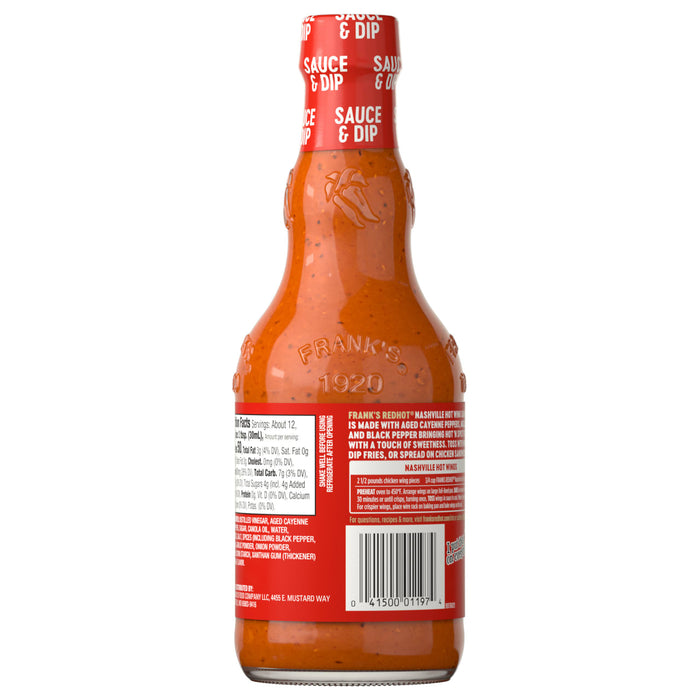 The back of a glass bottle of Franks Red Hot Regular Wing Hot Sauce Hot 12 Oz displays the nutritional information, ingredients, and recipe suggestions for Nashville Hot Wings.