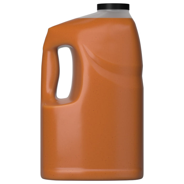 A large, translucent jug with a handle, filled with Franks Red Hot Regular Wing Hot Sauce Mild 128 Oz, is displayed against a plain white background.