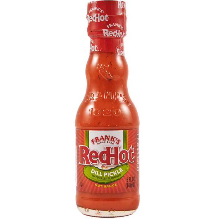 ["A bottle of Frank's RedHot Dill Pickle hot sauce."]