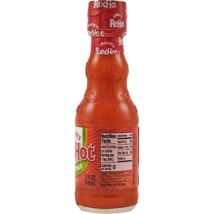 ["A bottle of Frank's RedHot Original Hot Sauce with a pickle flavor."]