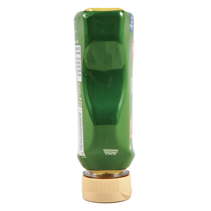 ['A green bottle of Kraft Salad Dressing with a yellow lid.']