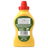 A green inverted squeeze bottle of Frenchs Dill Pickle Sandwich Spread Regular Inverted Squeeze Bottle Rp 12 Oz is presented, displaying its nutrition facts and ingredients on the label.