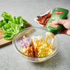 A hand is squeezing French's Creamy Dill Pickle Mustard into a bowl of chopped eggs, red onion, and paprika.