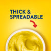 A close-up shot highlights the texture of Frenchs Dill Pickle Sandwich Spread Regular Inverted Squeeze Bottle Rp 12 Oz in a white bowl, with text above reading THICK &amp; SPREADABLE.