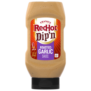 ["A bottle of Frank's RedHot Dip'n Roasted Garlic Sauce."]