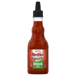["A bottle of Frank's RedHot Sriracha Squeeze sauce."]