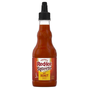 ["A bottle of Frank's RedHot Squeeze Hot Honey Sauce is displayed."]