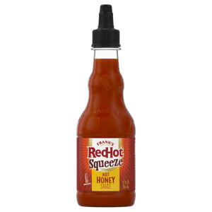 ["A bottle of Frank's RedHot Squeeze Hot Honey Sauce is displayed."]