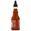 ["A bottle of Frank's RedHot Squeeze Hot Honey Sauce with tips and tricks on the label."]