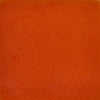 ['A close-up of a bright orange sauce.']