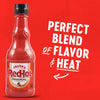 A bottle of Frank's RedHot Original Cayenne Pepper Sauce with the text 'A premium blend of aged cayenne peppers, it's the perfect blend of flavor &amp; heat.'