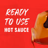 A large plastic jug of Franks Red Hot Mango Habanero Wing Hot Sauce Regular 64 Oz is being poured against a vibrant red background with the text READY TO USE HOT SAUCE.