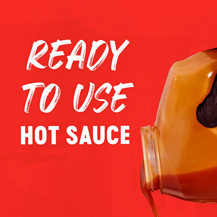 A large plastic jug of Franks Red Hot Mango Habanero Wing Hot Sauce Regular 64 Oz is being poured against a vibrant red background with the text READY TO USE HOT SAUCE.