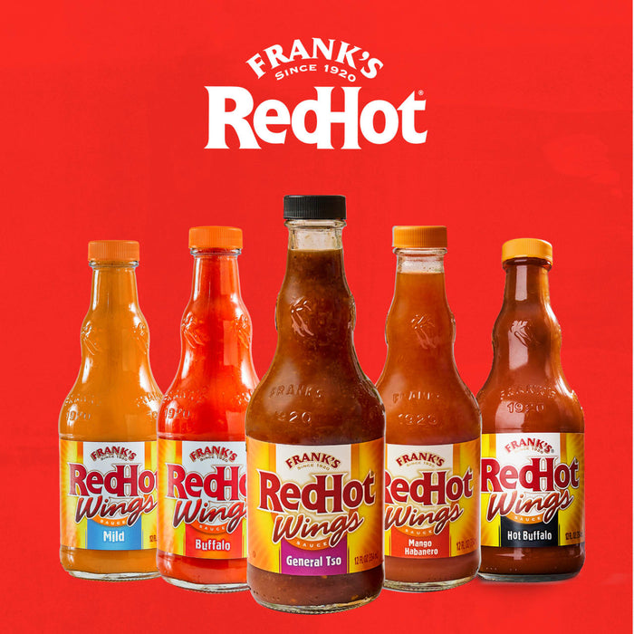 Five bottles of Franks RedHot Wings Sauce in different flavors are displayed against a red background.