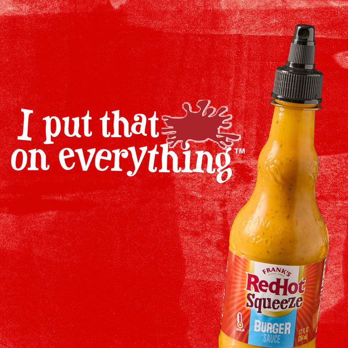A bottle of Frank\s RedHot Squeeze Burger Sauce with the tagline I put that on everything.