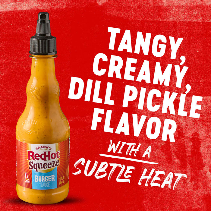 A bottle of Frank\s RedHot Squeeze Burger Sauce with a red background and text that reads Tangy Creamy Dill Pickle Flavor with a Subtle Heat.