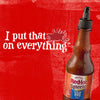 A bottle of Frank\s RedHot Squeeze Korean BBQ Sauce on a red background with the text I put that on everything.