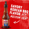A bottle of Franks RedHot Squeeze Korean BBQ sauce with medium heat.