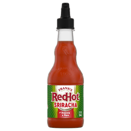 A bottle of Franks RedHot Sriracha chili sauce.