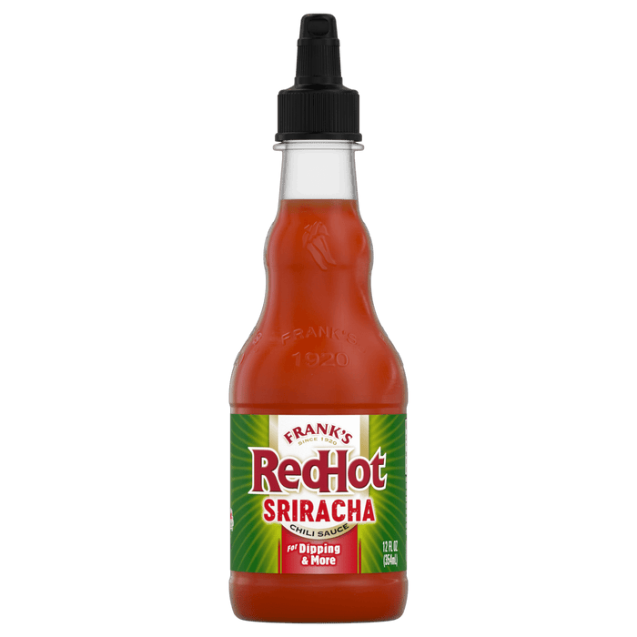 A bottle of Franks RedHot Sriracha chili sauce.
