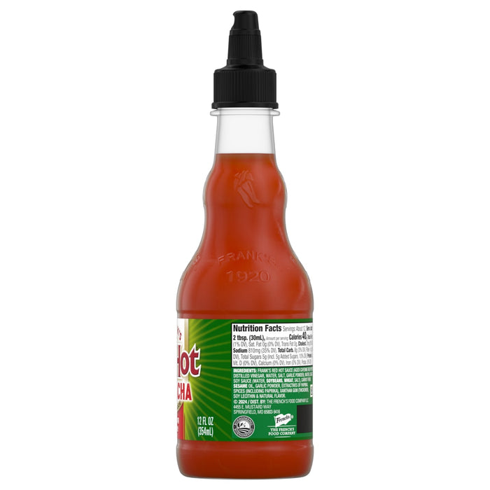 A bottle of Franks RedHot Hot Sauce with a green label and a red cap.