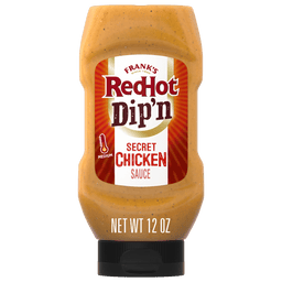 A bottle of Franks RedHot Dipn Secret Chicken Sauce.