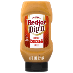 A bottle of Franks RedHot Dipn Secret Chicken Sauce.