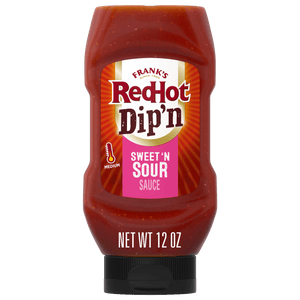 A bottle of Franks RedHot Dipn Sweet N Sour Sauce with a net weight of 12 oz.