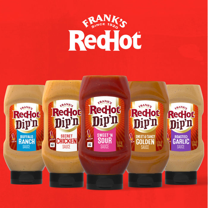 Five bottles of Franks RedHot Dipn sauces in various flavors including Buffalo Ranch Secret Chicken Sweet n Sour Sweet &amp; Tangy Golden and Roasted Garlic are displayed against a red background.