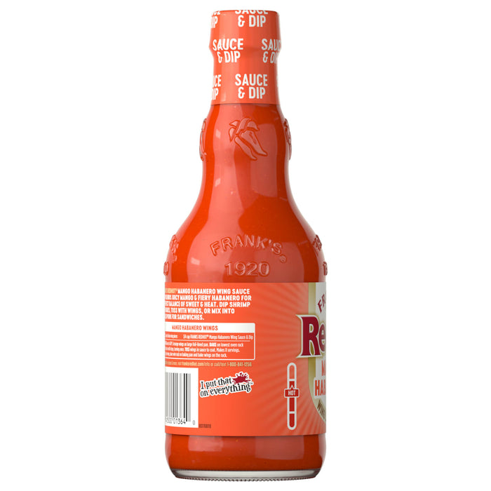 The back of a glass bottle of Franks Red Hot Mango Habanero Regular Hot Sauce Regular 12 Oz displays a recipe for Mango Habanero Wings, usage suggestions, and a heat meter.
