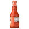 The back of a glass bottle of Franks Red Hot Mango Habanero Regular Hot Sauce Regular 12 Oz is shown, displaying the nutrition facts and ingredients list.