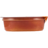 A side view of a small, sealed container of food, likely a dip or sauce.