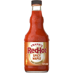 A glass bottle of Frank'S Redhot Spicy Maple Wings Sauce 12 Fl Oz, featuring a red and gold label with the brand name and product description.