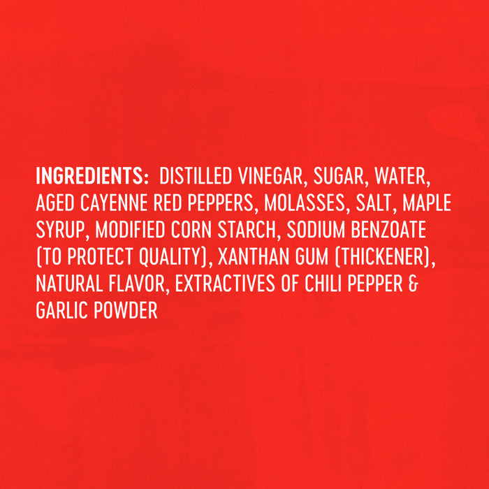 The image shows the ingredient list for a food product, including distilled vinegar, sugar, aged cayenne red peppers, and maple syrup.