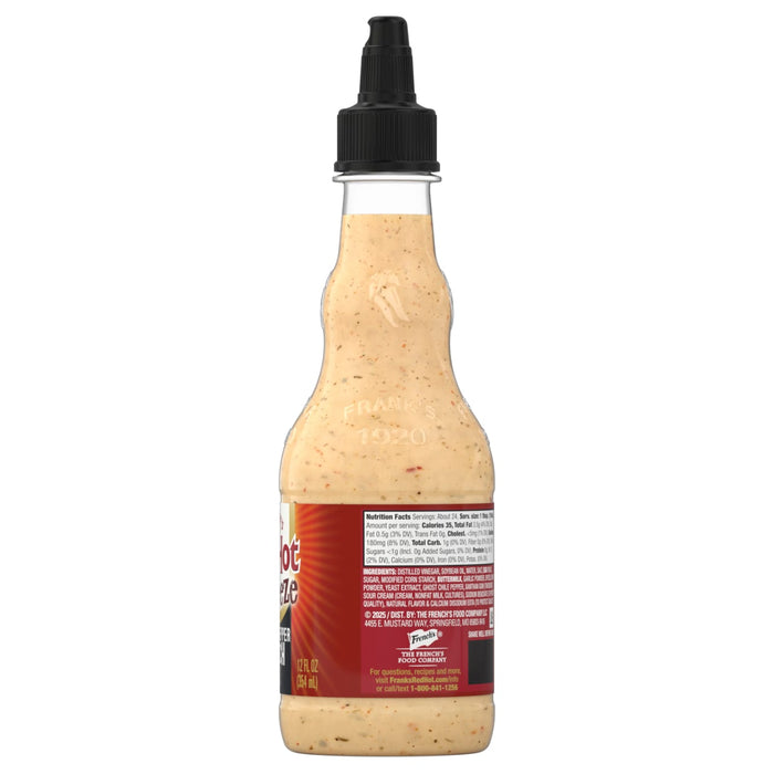 A bottle of Zaxby's Zax Sauce is shown from the back, displaying the product information label.