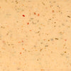 A creamy, speckled sauce with visible herbs and spices, suggesting a flavorful condiment or dressing.