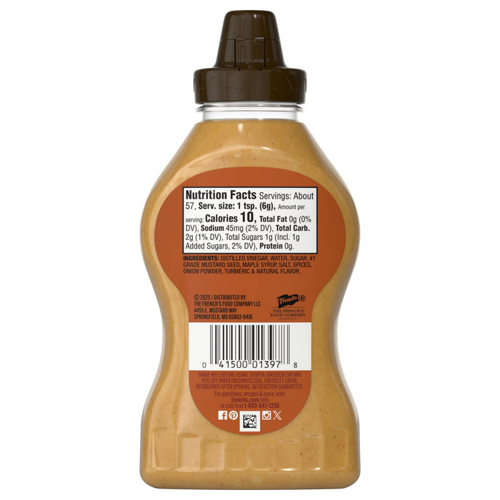 A bottle of French's Stone Ground Dijon Mustard shows the nutrition facts and barcode on its label.