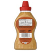 A bottle of French's Stone Ground Dijon Mustard shows the nutrition facts and barcode on its label.