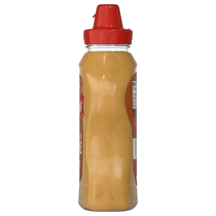 A bottle of Trader Joe's Carolina Gold BBQ Sauce is shown.