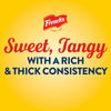 A promotional graphic for FrenchS Tomato Ketchup, 20 Oz featuring the brand logo and text describing it as sweet, tangy, with a rich and thick consistency against a yellow background.
