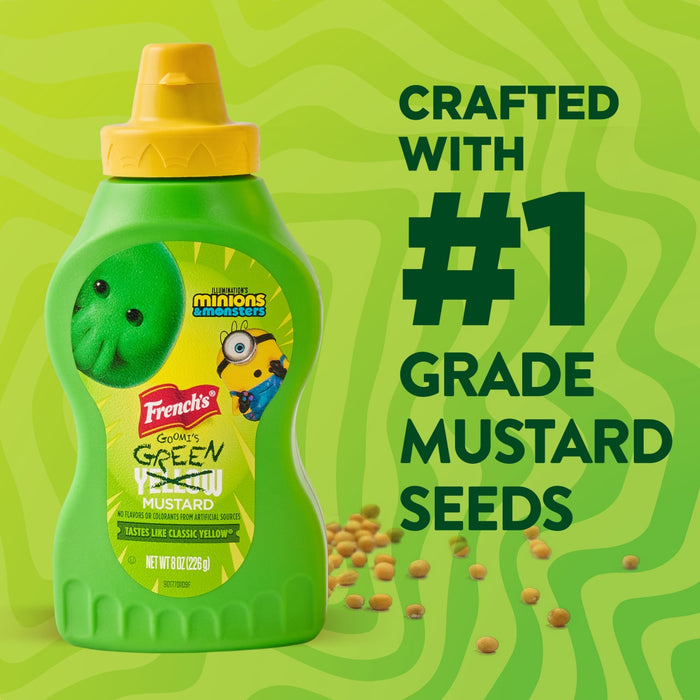 A green squeeze bottle of French'S Goomi'S Green Mustard, 8.0 Oz, featuring Minions characters, is displayed against a green background with the text Crafted with #1 Grade Mustard Seeds.