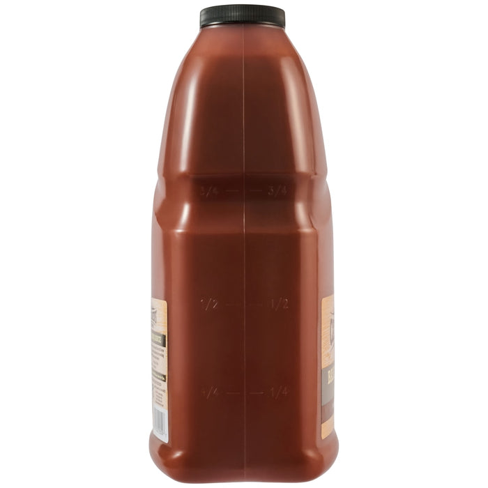 This side view of the Cattlemens Smoky Barbeque Sauce Plastic Jug 128 Oz shows the measurement markings embossed on the plastic.