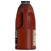 ['A plastic bottle of a brand of barbecue sauce.']