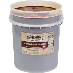 ["A 5-gallon bucket of Cattlemen's Kansas City Classic BBQ Sauce."]
