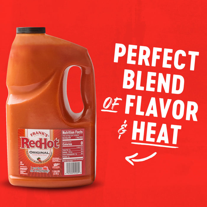 A gallon jug of Frank\'s RedHot Original Cayenne Pepper Sauce with a red background that says Aged Cayenne Peppers for the Perfect Blend of Flavor &amp; Heat.