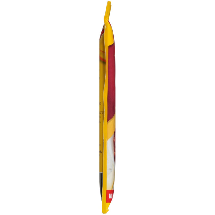 ['A side view of a yellow and red pouch of McCormick Grill Mates Montreal Steak Seasoning.']